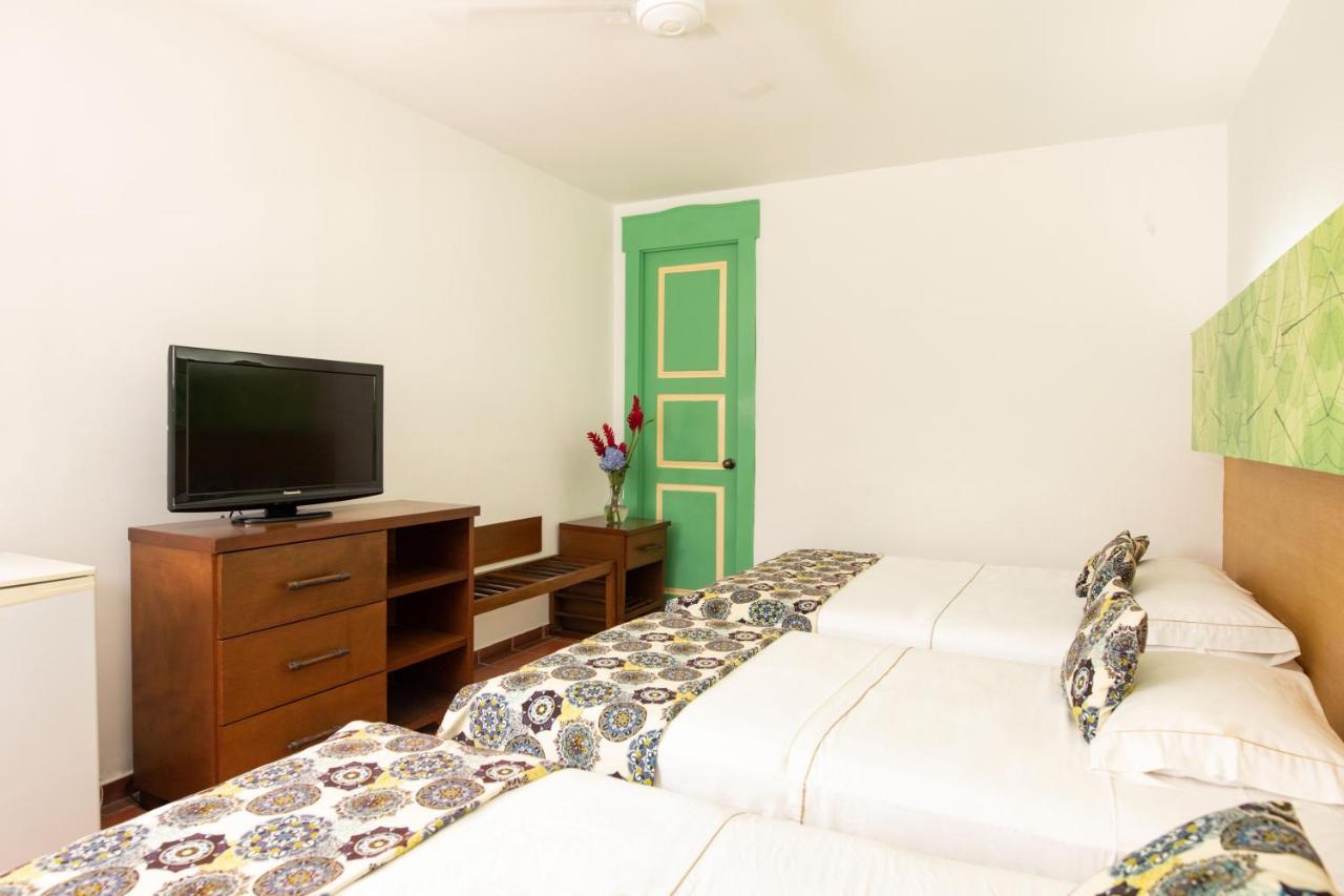 Hotel Eden Parque Del Cafe Монтенегро Стая снимка